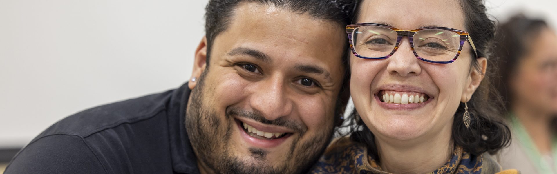 A photo of 2 members from the UConn Waterbury Afro Latino Panel in the Urban and Community Studies class